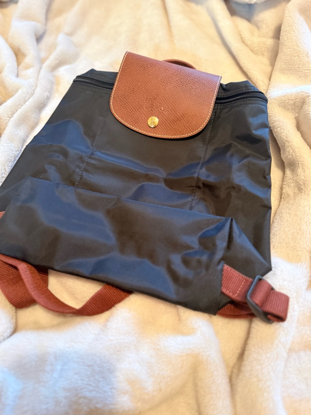 Longchamp Black Nylon Backpack with Brown Leather Flap and Brown Straps